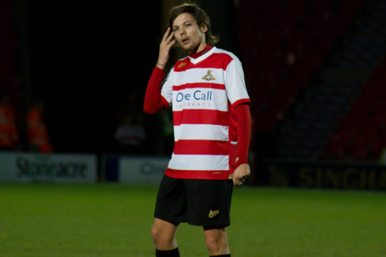 Louis Tomlinson playing for Doncaster Rovers
